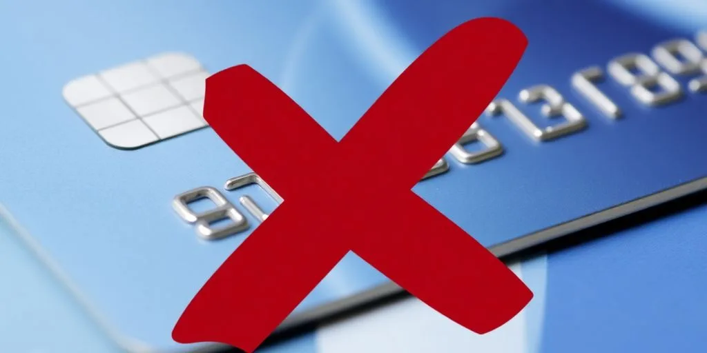 A credit card with a red 'X' mark over it.